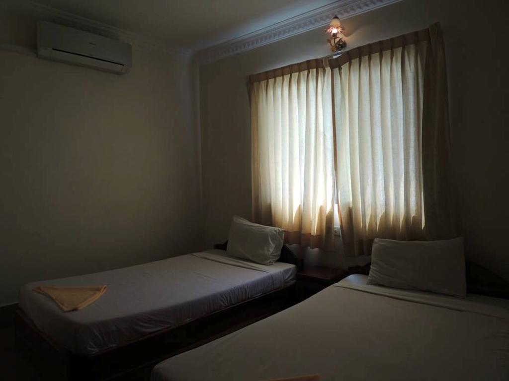 Shang Hai Guesthouse Battambang Pokoj fotografie